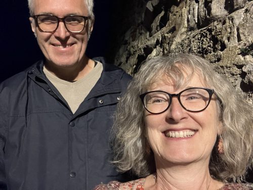 album No2 Update feature image Selfie of Jim and Josie standing in front of a wall, in Lymen Regis, smiling at the camera