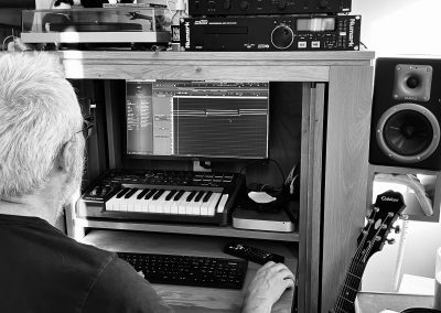 man at recording desk